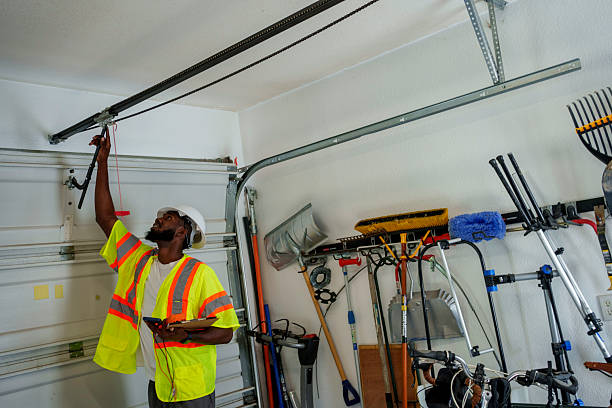 Professional Garage Door Panel Replacement technician working in Danville, PA